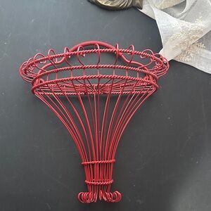 Red metal hanging basket decor